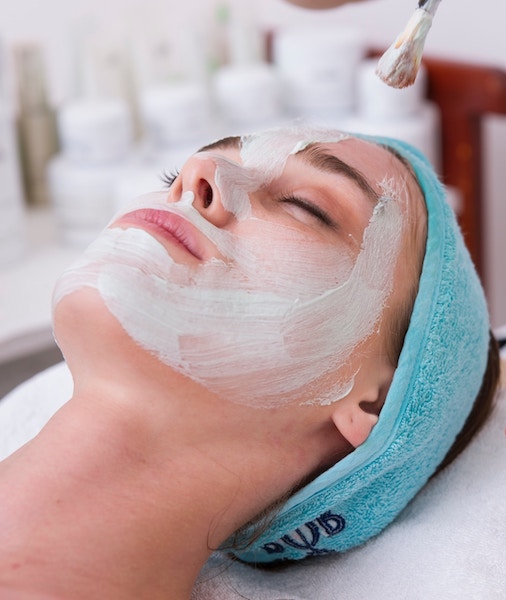 woman having facial skin treatment