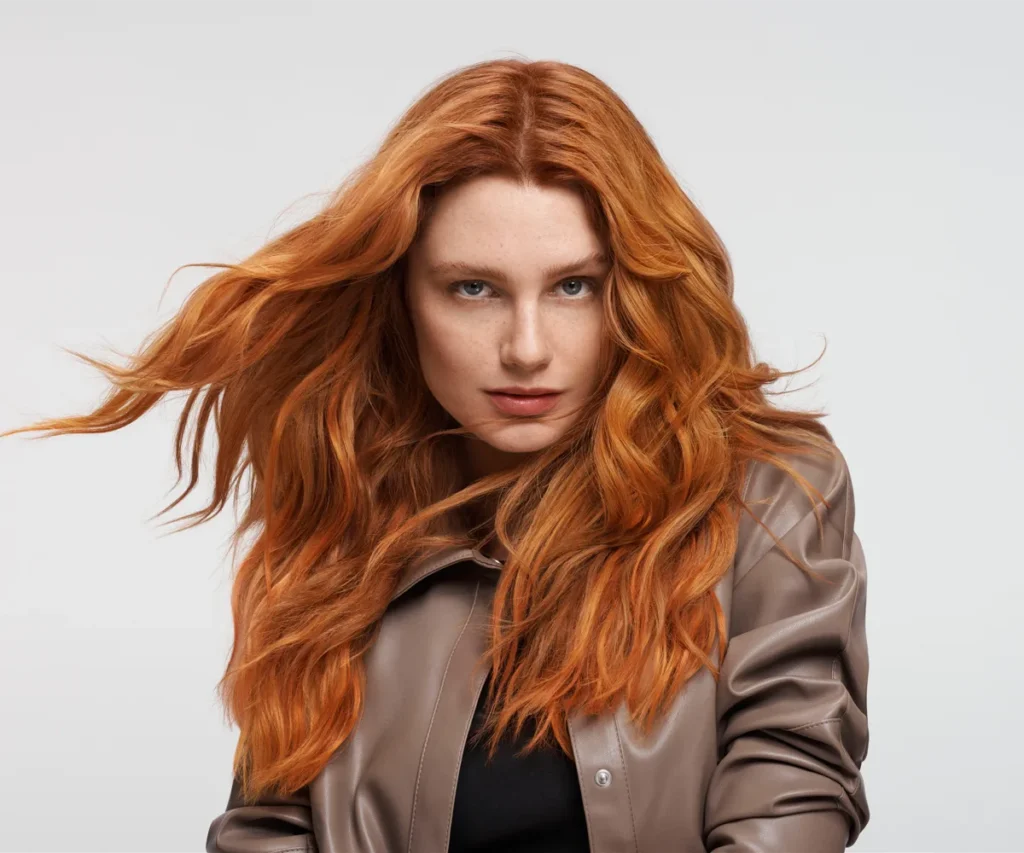 A stylish woman with professionally blow-dried hair, benefiting from our exclusive salon offers Holborn.